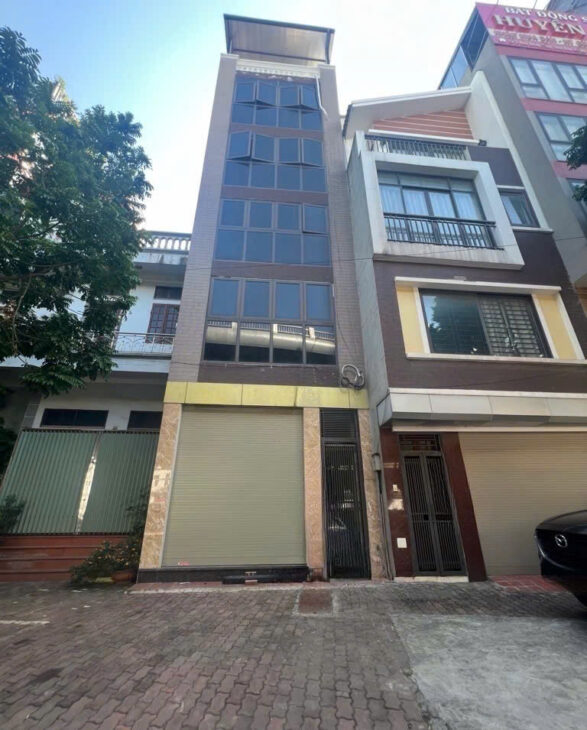 CẦN BÁN GÂP NHÀ MẶT PhỐ – KINH DOANH BẤT CHẤP – TOÀ NHÀ 6 TẦNG – GARA- THANG MÁY. Đàm Quang Trung –