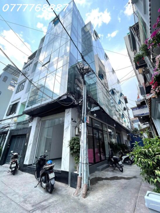 Bán tòa nhà VP Gần Hai Bà Trung Quận 1, 5 tầng đẹp HĐT 100tr/tháng