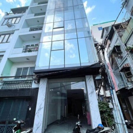 Bán tòa nhà VP Gần Hai Bà Trung Quận 1, 5 tầng đẹp HĐT 100tr/tháng