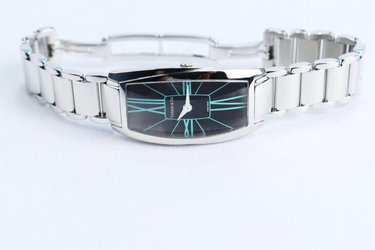 ĐH Nữ : Tiffany & Co. Gemea – Thép nguyên chiếc, Thiết kế mặt đen cọc giờ xanh Ngọc siêu hiếm đẹp