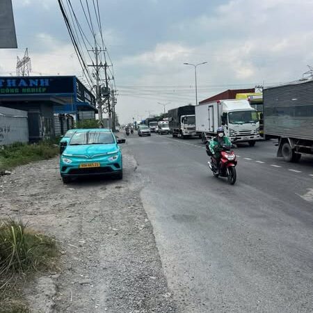 Bán đất mặt tiền 100x100m giá 12 triệu/m2 Đường Quốc Lộ 22