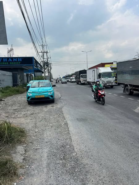 Bán đất mặt tiền 100x100m giá 12 triệu/m2 Đường Quốc Lộ 22