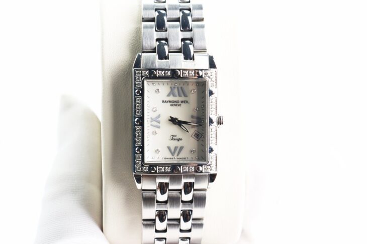 ĐH Nữ : Raymond Weil Tango mặt Xà Cừ – Niềng & cọc số đính full Kim Cương thiên nhiên