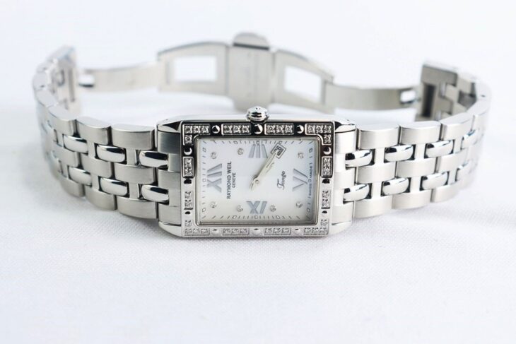 ĐH Nữ : Raymond Weil Tango mặt Xà Cừ – Niềng & cọc số đính full Kim Cương thiên nhiên